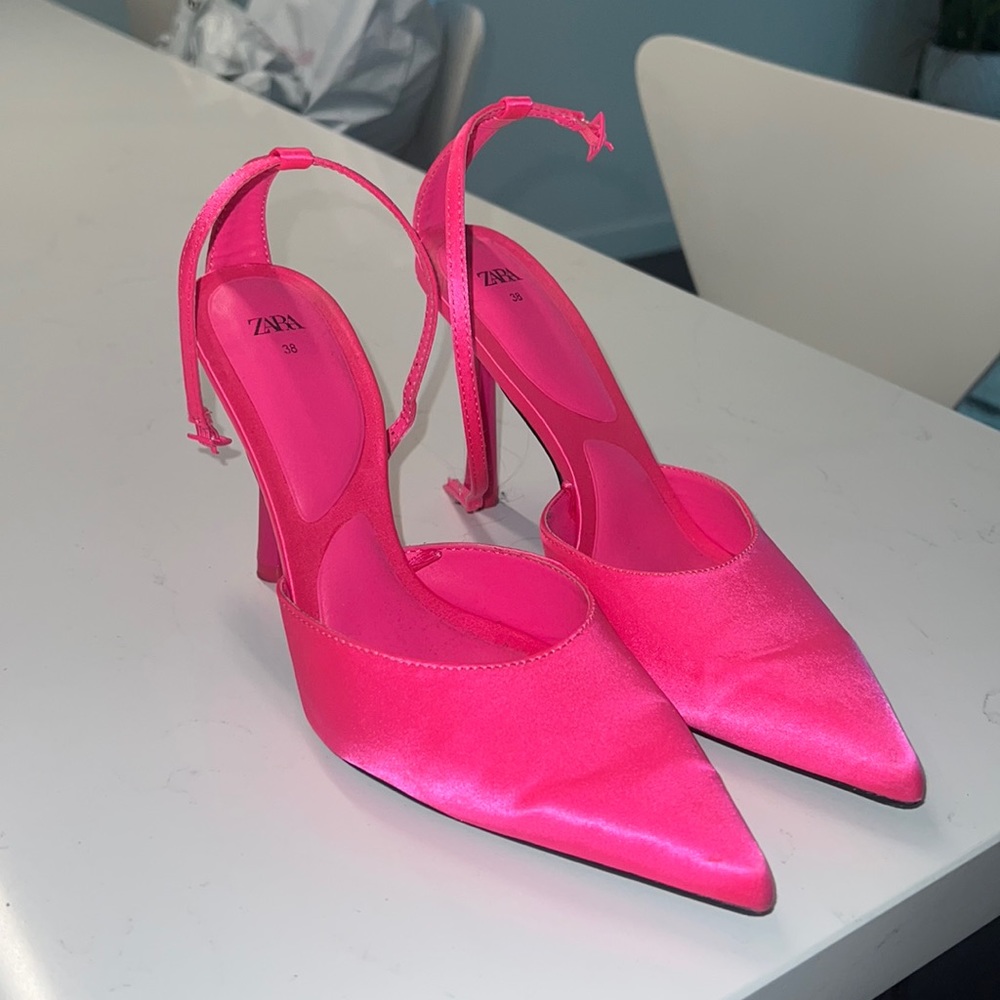 Neon pink pumps